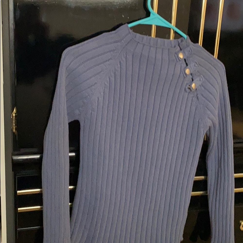 Sweater with snap shoulder